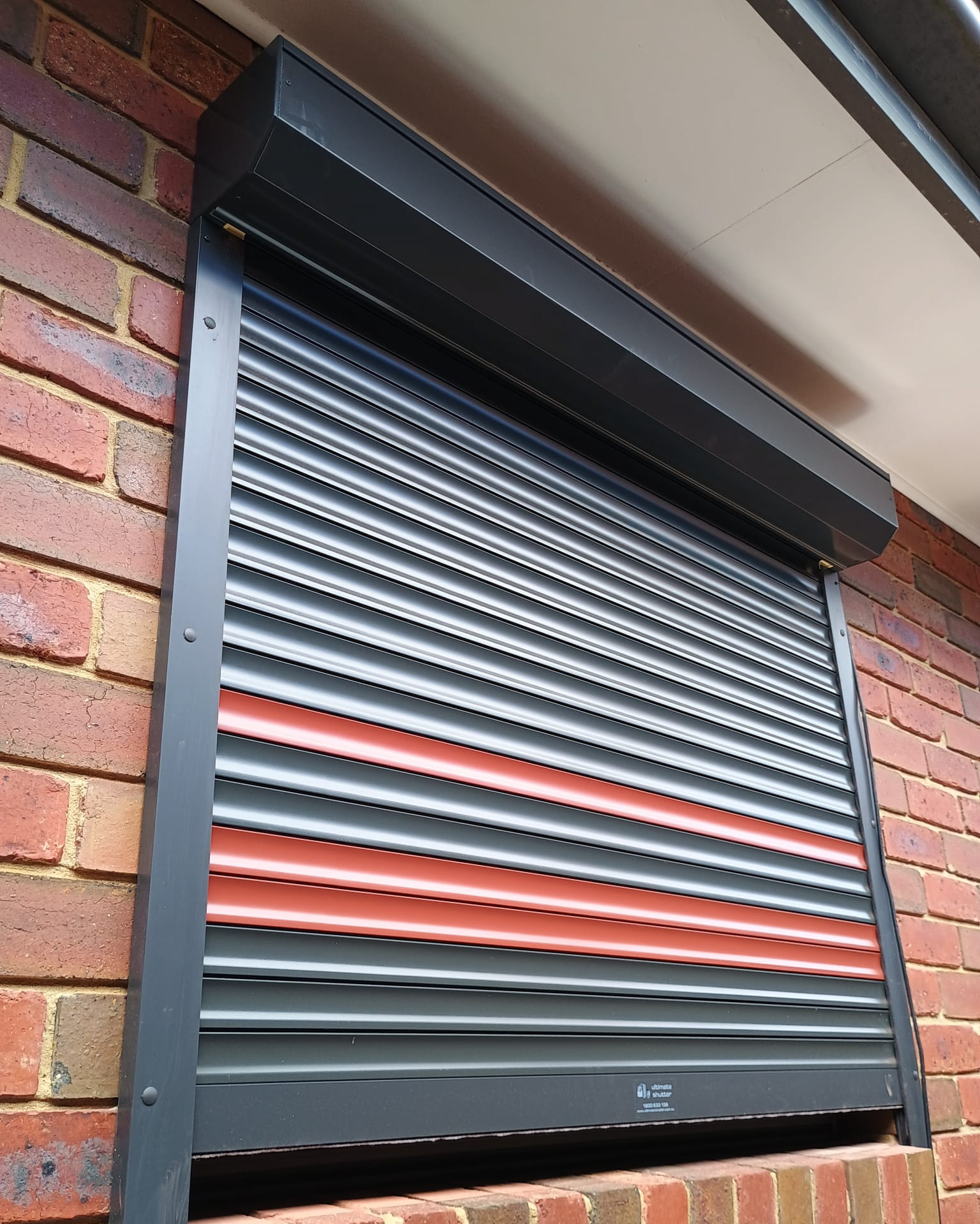 Roller shutter on brick home